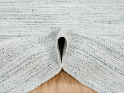Modern / Contemporary hand-knotted wool rug in Ivory, 8' x 8' — SKU O064771 (view 5)