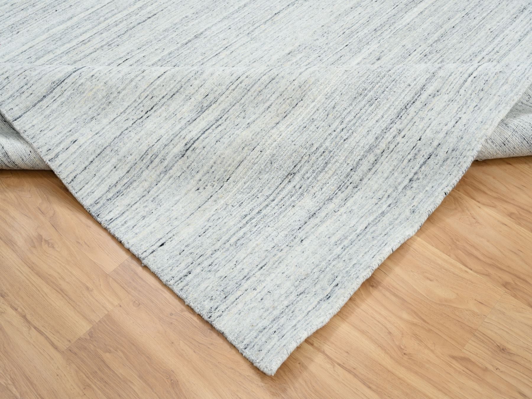 Modern / Contemporary hand-knotted wool rug in Ivory, 8' x 8' — SKU O064771 (view 6)