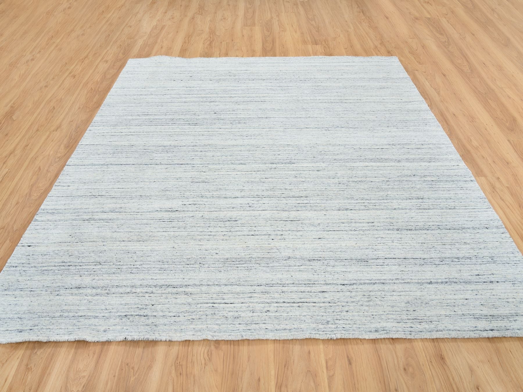 Modern / Contemporary hand-knotted wool rug in Ivory, 8' x 8' — SKU O064788 (view 2)