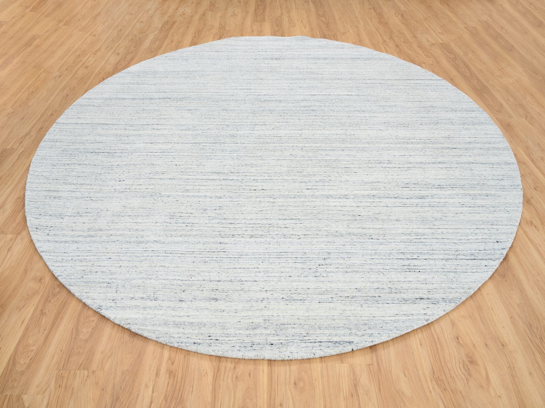 Modern / Contemporary hand-knotted wool rug in Ivory, 10' x 10' — SKU O064795 (view 2)