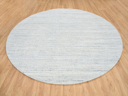 Modern / Contemporary hand-knotted wool rug in Ivory, 10' x 10' — SKU O064795 (view 2)