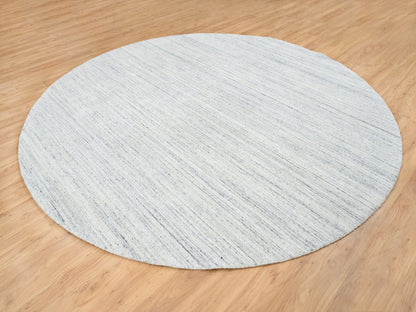 Modern / Contemporary hand-knotted wool rug in Ivory, 10' x 10' — SKU O064795 (view 3)