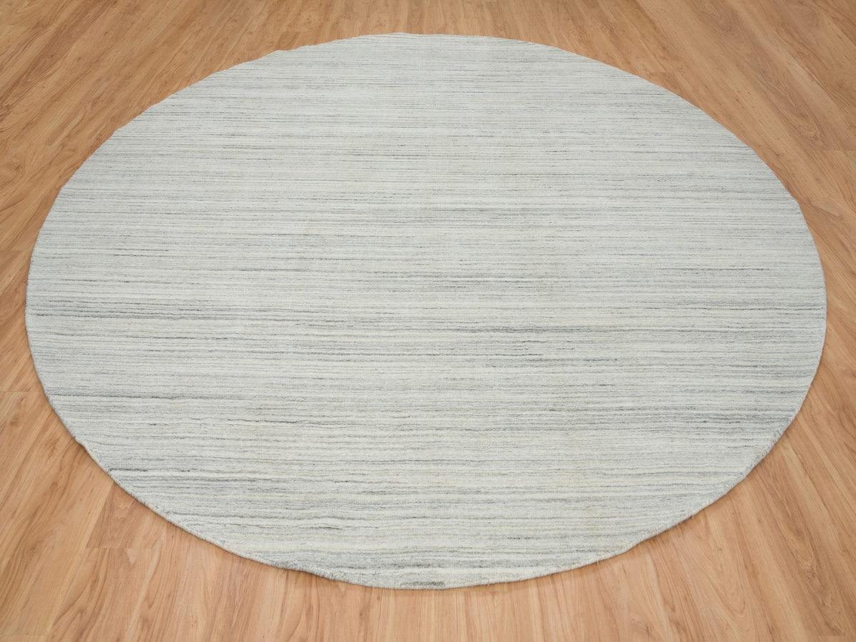 Modern / Contemporary hand-knotted wool rug in Ivory, 12'1" x 12'1" — SKU O065000 (view 2)