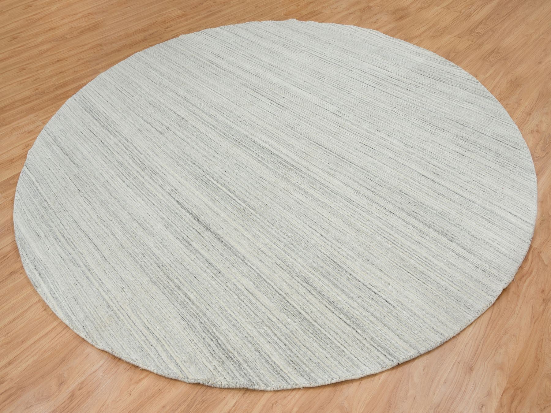 Modern / Contemporary hand-knotted wool rug in Ivory, 12'1" x 12'1" — SKU O065000 (view 3)