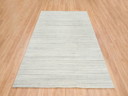 Ivory 6'1" x 9'0" Modern and Contemporary Handloom Wool Rug - Sku: O065008