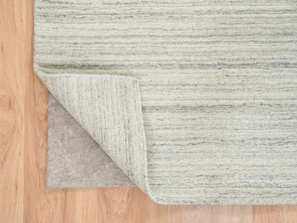 Ivory 6'1" x 9'0" Modern and Contemporary Handloom Wool Rug - Sku: O065008