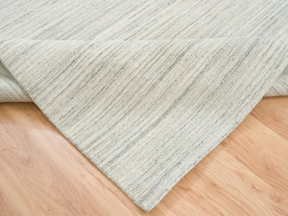 Ivory 6'1" x 9'0" Modern and Contemporary Handloom Wool Rug - Sku: O065008