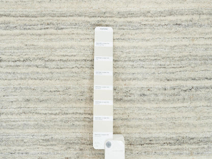 Ivory 6'1" x 9'0" Modern and Contemporary Handloom Wool Rug - Sku: O065008