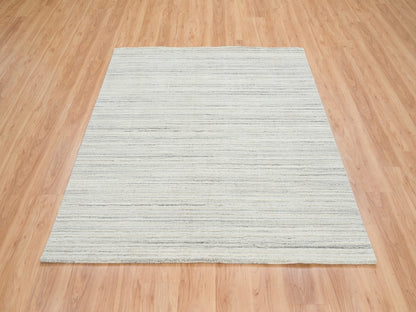 Modern / Contemporary hand-knotted wool rug in Ivory, 6' x 6'2" — SKU O065010 (view 2)