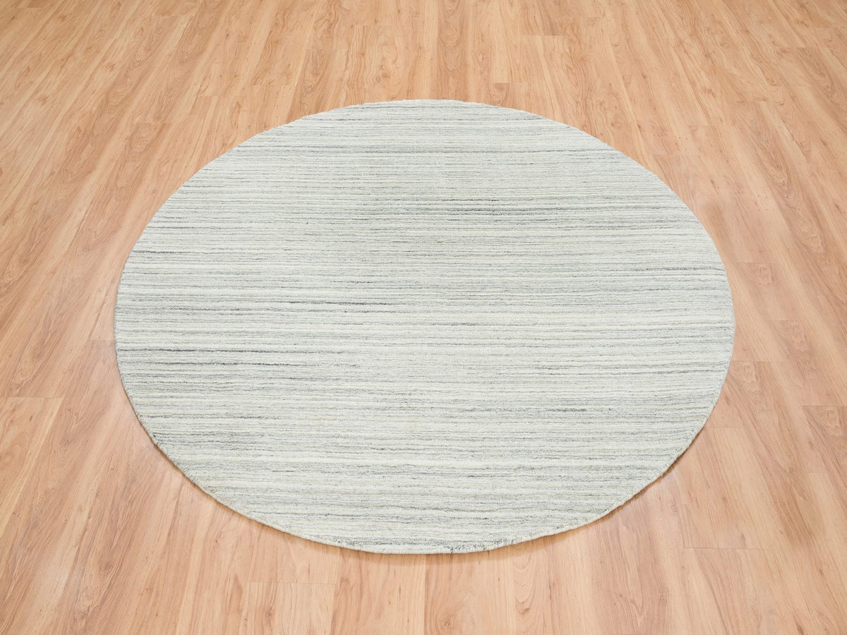 Modern / Contemporary hand-knotted wool rug in Ivory, 6'1" x 6'1" — SKU O065014 (view 2)