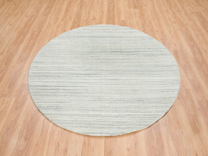 Modern / Contemporary hand-knotted wool rug in Ivory, 6'1" x 6'1" — SKU O065014 (view 2)