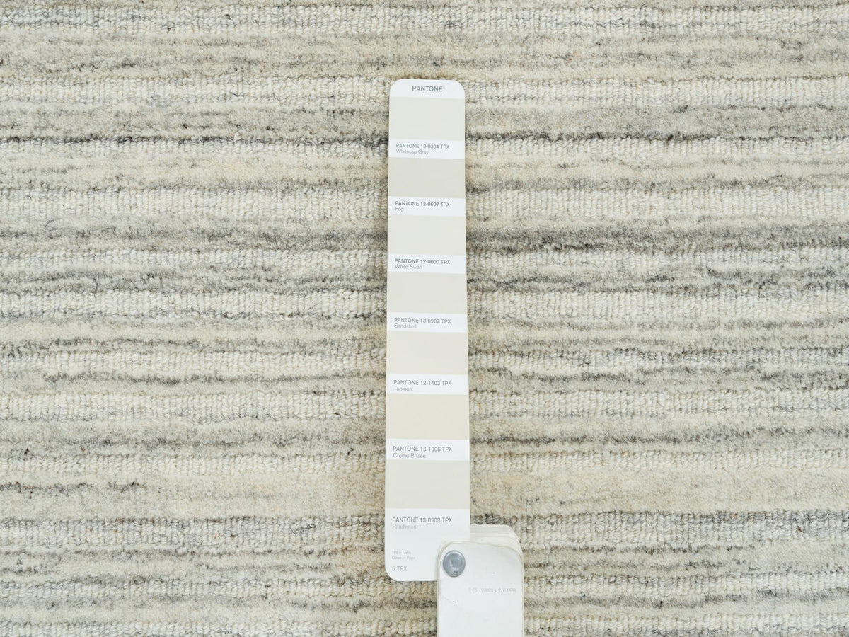 Modern / Contemporary hand-knotted wool rug in Ivory, 6'1" x 6'1" — SKU O065014 (view 4)