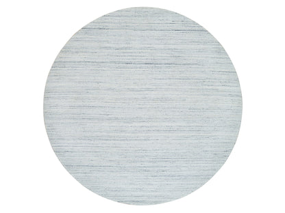 Modern / Contemporary hand-knotted wool rug in Ivory, 10' x 10' — SKU O065431