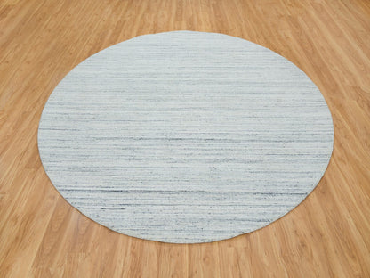 Modern / Contemporary hand-knotted wool rug in Ivory, 10' x 10' — SKU O065431 (view 2)