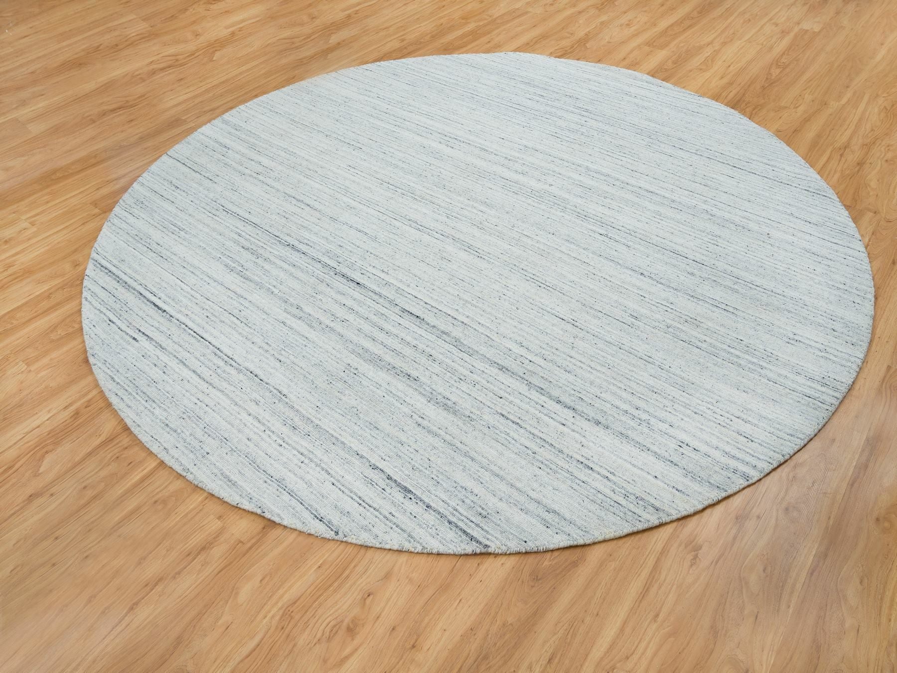 Modern / Contemporary hand-knotted wool rug in Ivory, 10' x 10' — SKU O065431 (view 3)