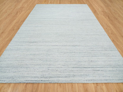 Modern / Contemporary hand-knotted wool rug in Ivory, 10'1" x 14'1" — SKU O065451 (view 2)
