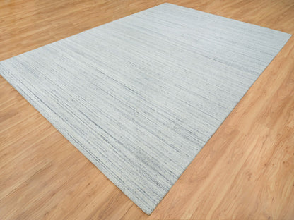 Modern / Contemporary hand-knotted wool rug in Ivory, 10'1" x 14'1" — SKU O065451 (view 3)
