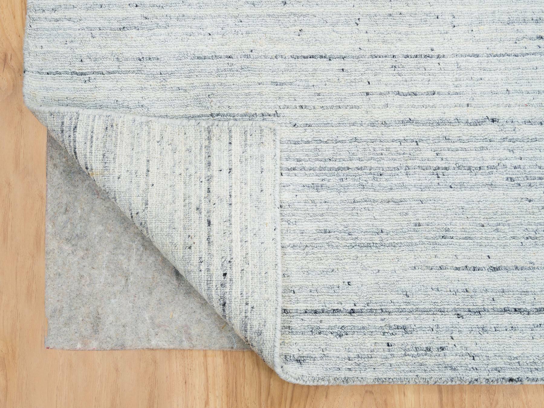 Modern / Contemporary hand-knotted wool rug in Ivory, 10'1" x 14'1" — SKU O065451 (view 4)
