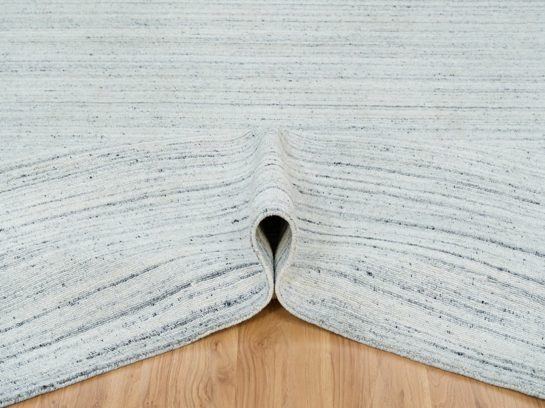 Modern / Contemporary hand-knotted wool rug in Ivory, 10'1" x 14'1" — SKU O065451 (view 5)