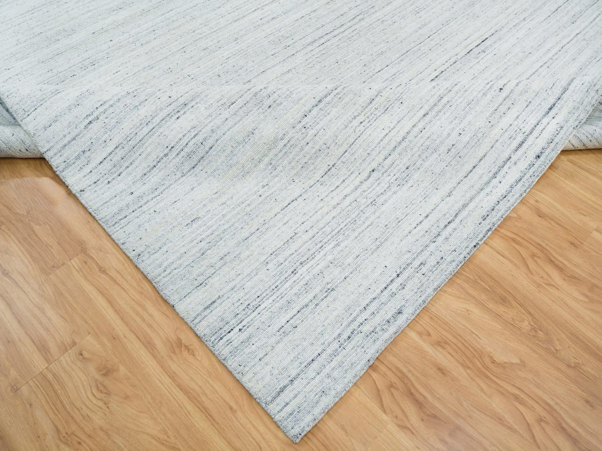 Modern / Contemporary hand-knotted wool rug in Ivory, 10'1" x 14'1" — SKU O065451 (view 6)