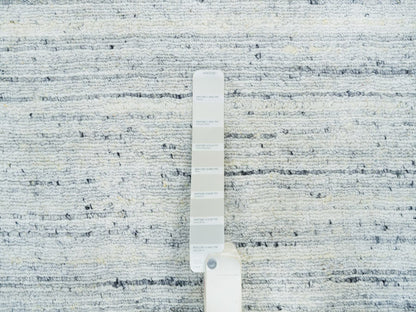 Modern / Contemporary hand-knotted wool rug in Ivory, 10'1" x 14'1" — SKU O065451 (view 7)