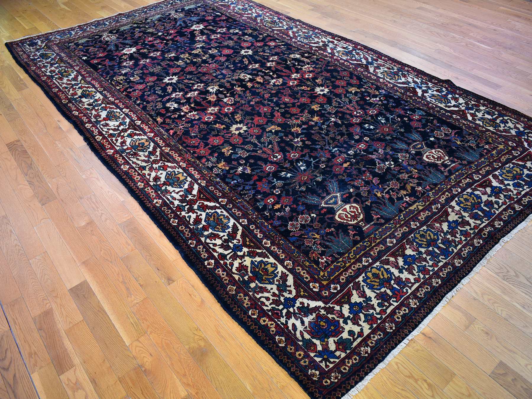 Antique hand-knotted wool rug in Blue & Ivory, 7'2" x 13'1" — SKU O066809 (view 3)