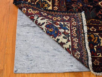 Antique hand-knotted wool rug in Blue & Ivory, 7'2" x 13'1" — SKU O066809 (view 8)