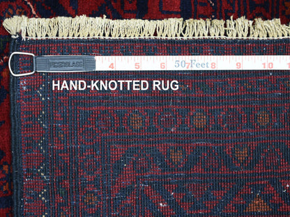 Red 5'6" x 8'0" Tribal Hand knotted Wool Rug - Sku: O071776