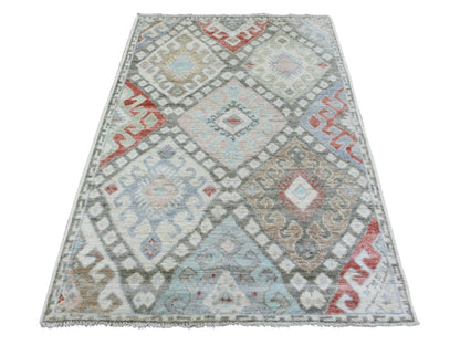 Tribal & Geometric hand-knotted wool rug in Multicolored, 4' x 6'1" — SKU O072743
