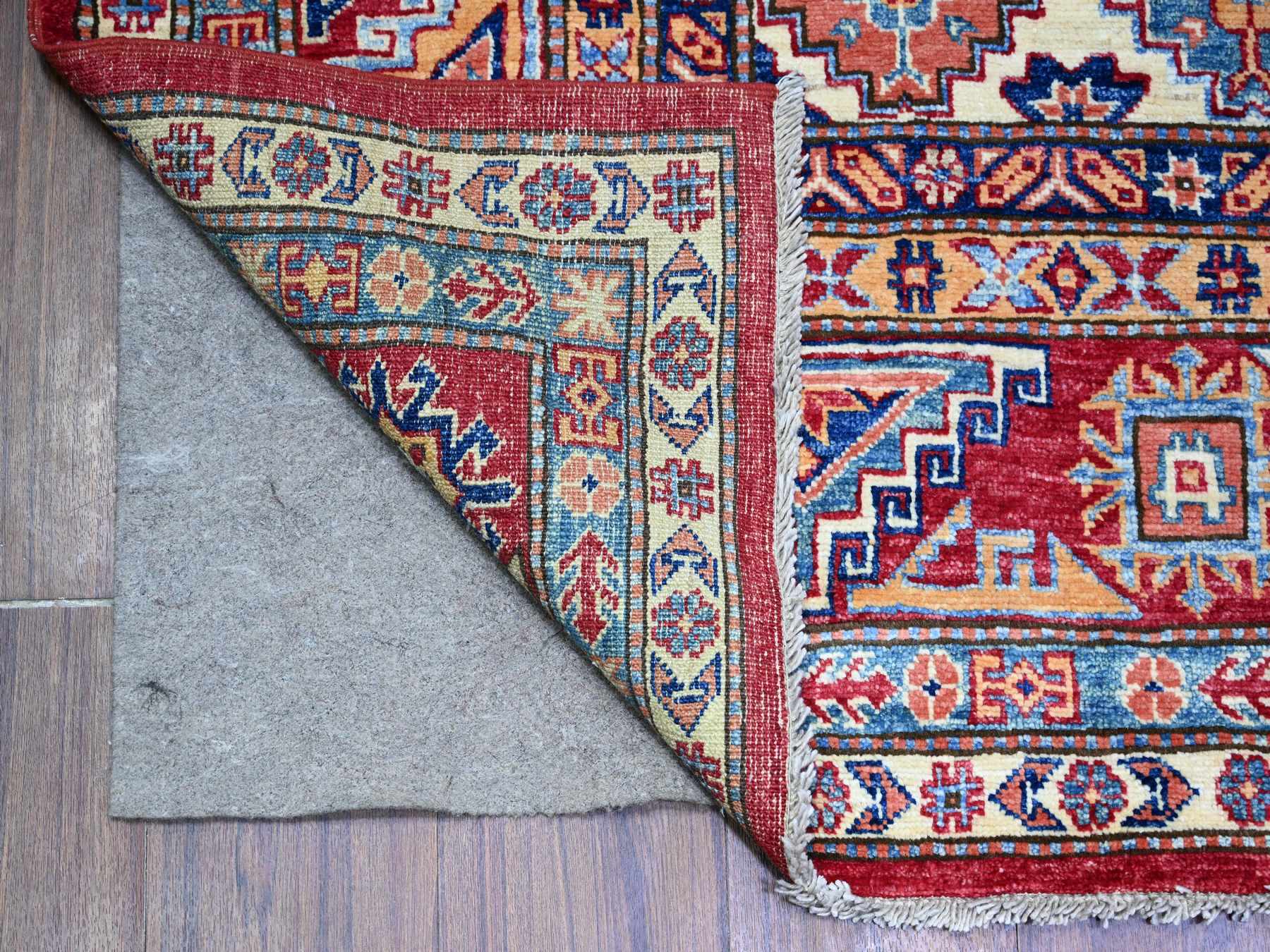 Kazak Tribal & Geometric hand-knotted wool rug in Red & Vista White, 7' x 9'11" — SKU O074823 (view 2)