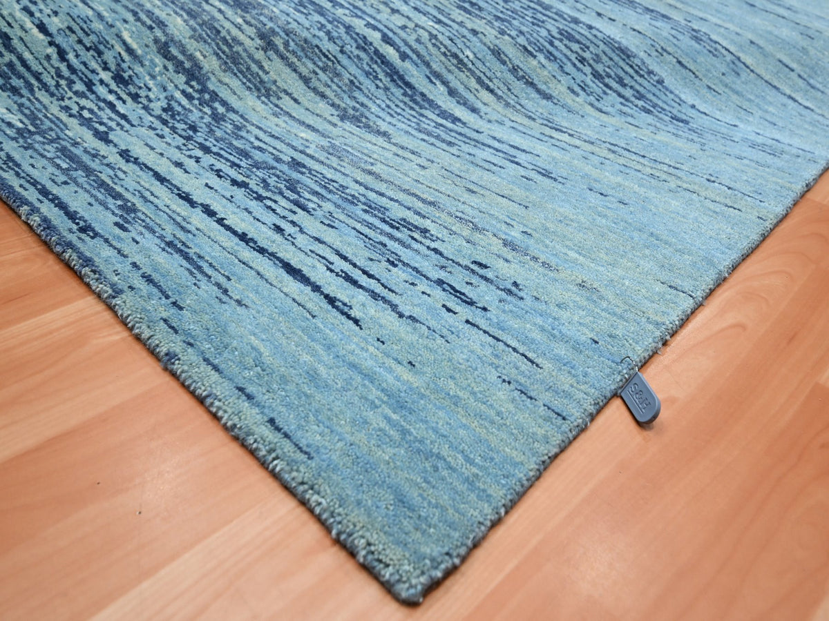 Modern / Contemporary hand-knotted wool rug in Blue, 8'1" x 10'4", SKU O075519