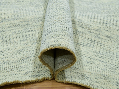 Ivory 6'0" x 9'0" Modern and Contemporary Hand knotted Wool Rug - Sku: O076025