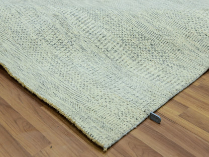 Ivory 6'0" x 9'0" Modern and Contemporary Hand knotted Wool Rug - Sku: O076025