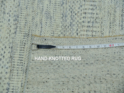 Ivory 5'4" x 7'1" Modern and Contemporary Hand knotted Wool Rug - Sku: O076026