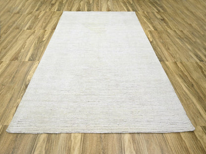 Modern / Contemporary hand-knotted wool rug in Ivory, 9' x 12' — SKU O076215 (view 2)