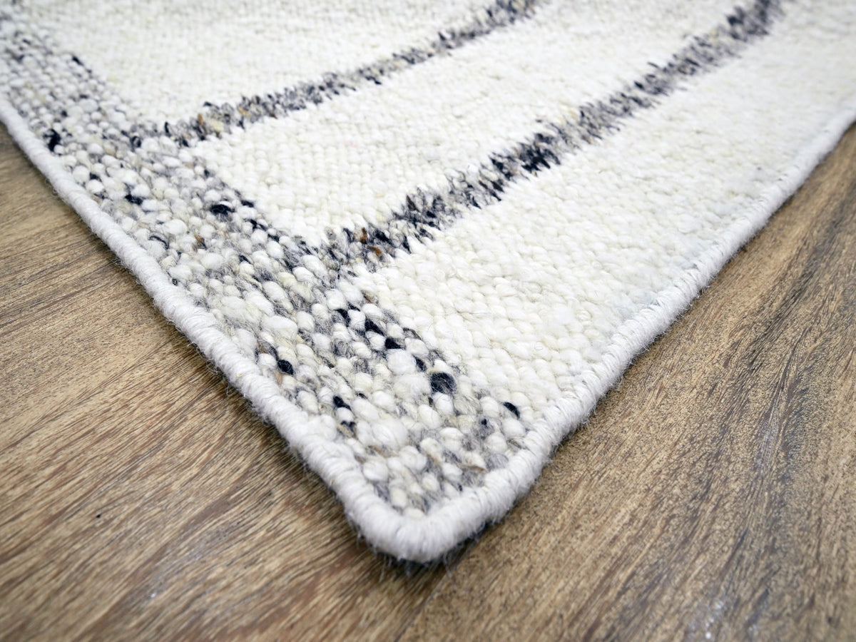 Modern / Contemporary hand-knotted wool rug in Ivory, 8'2" x 10'2" — SKU O076217 (view 6)