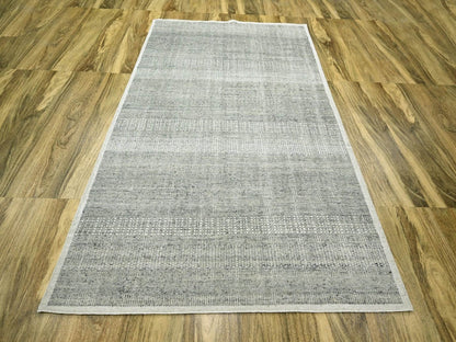Modern / Contemporary hand-knotted wool rug in Gray, 5'11" x 9' — SKU O076735 (view 2)