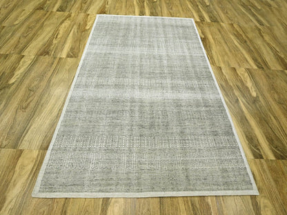 Modern / Contemporary hand-knotted wool rug in Gray, 6'1" x 9' — SKU O076736 (view 2)