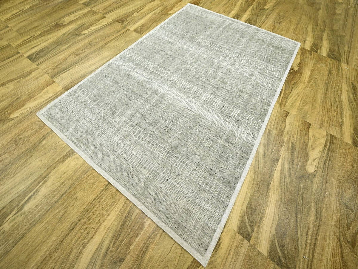Modern / Contemporary hand-knotted wool rug in Gray, 6'1" x 9' — SKU O076736 (view 3)