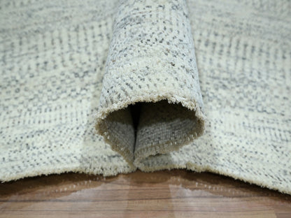 Ivory 7'11" x 9'10" Modern and Contemporary Hand knotted Wool Rug - Sku: O076916