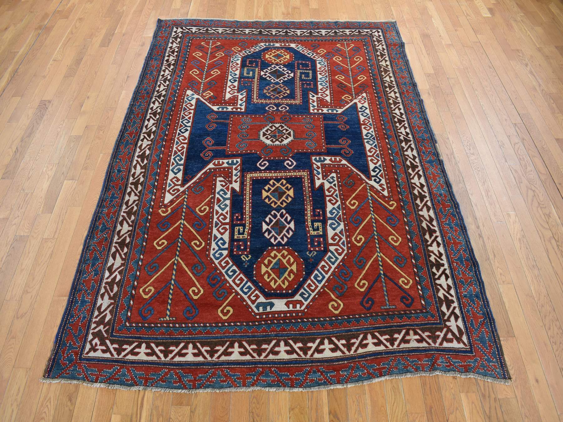 Kazak Antique hand-knotted wool rug in Red, 6'10" x 9'3", SKU O078056