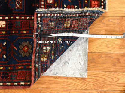 Antique hand-knotted wool rug in Red & Navy Blue, 5' x 8'6" — SKU O078487 (view 6)