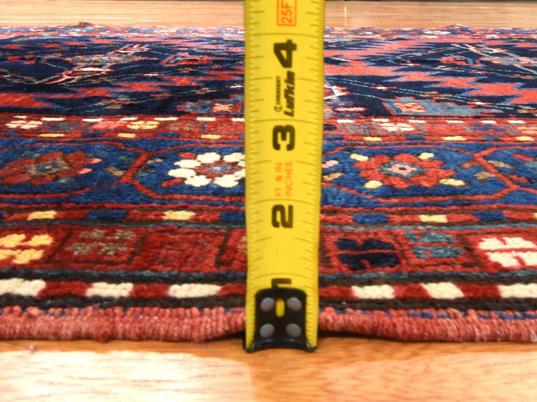 Antique hand-knotted wool rug in Red & Navy Blue, 5' x 8'6" — SKU O078487 (view 7)