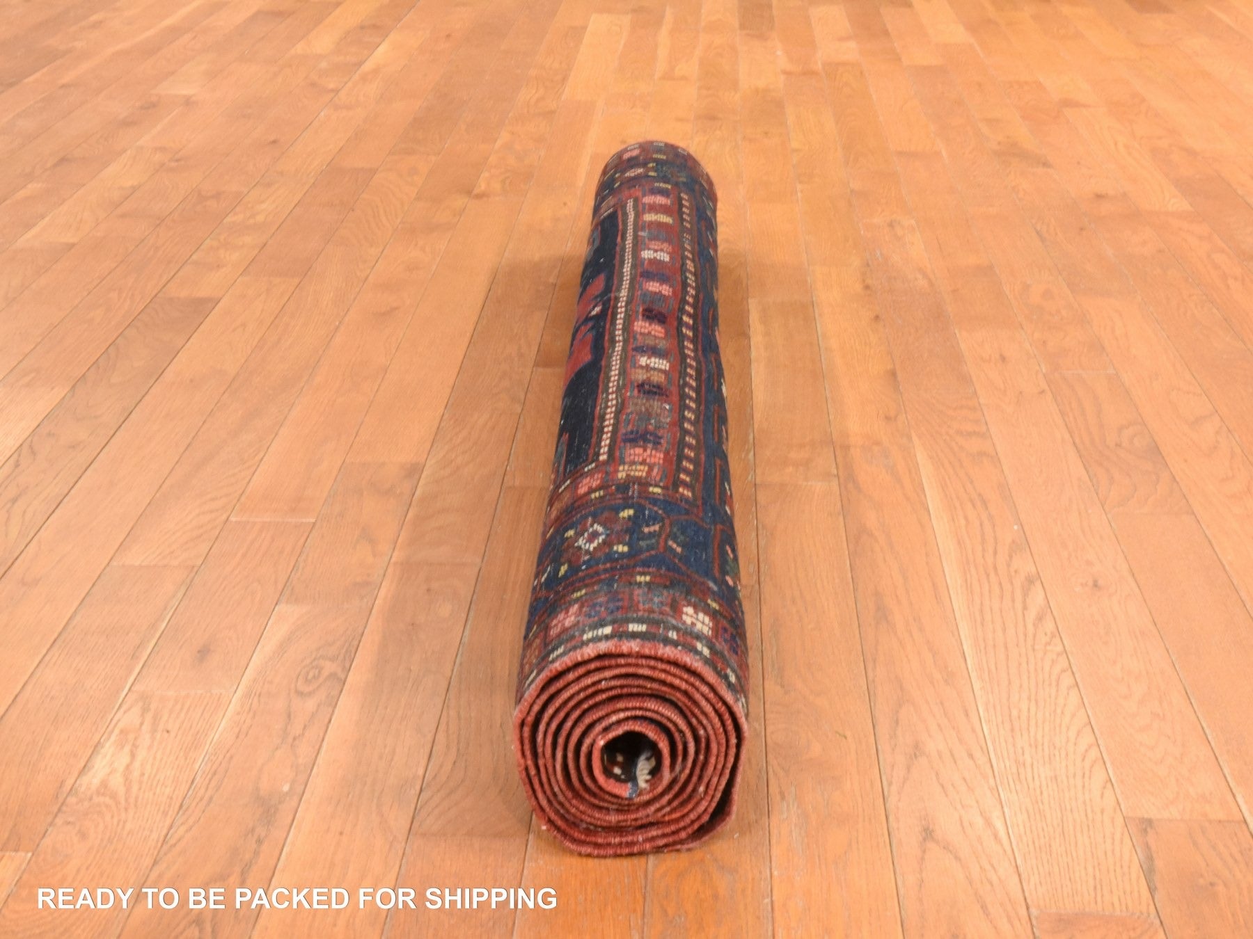 Antique hand-knotted wool rug in Red & Navy Blue, 5' x 8'6" — SKU O078487 (view 8)