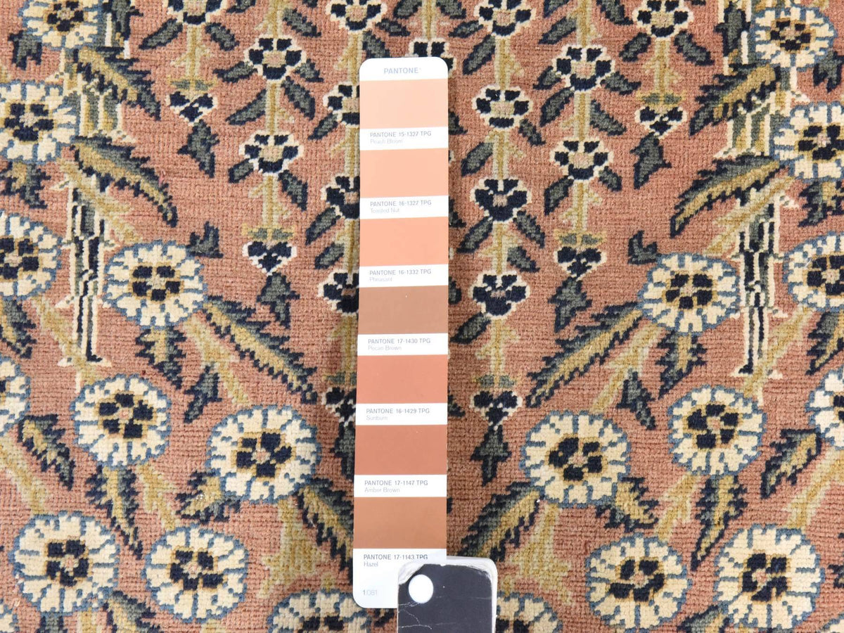 Fine Oriental hand-knotted wool rug in Pink, 4'2" x 5'8" — SKU O078510 (view 2)