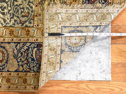 Fine Oriental hand-knotted wool rug in Pink, 4'2" x 5'8" — SKU O078510 (view 3)