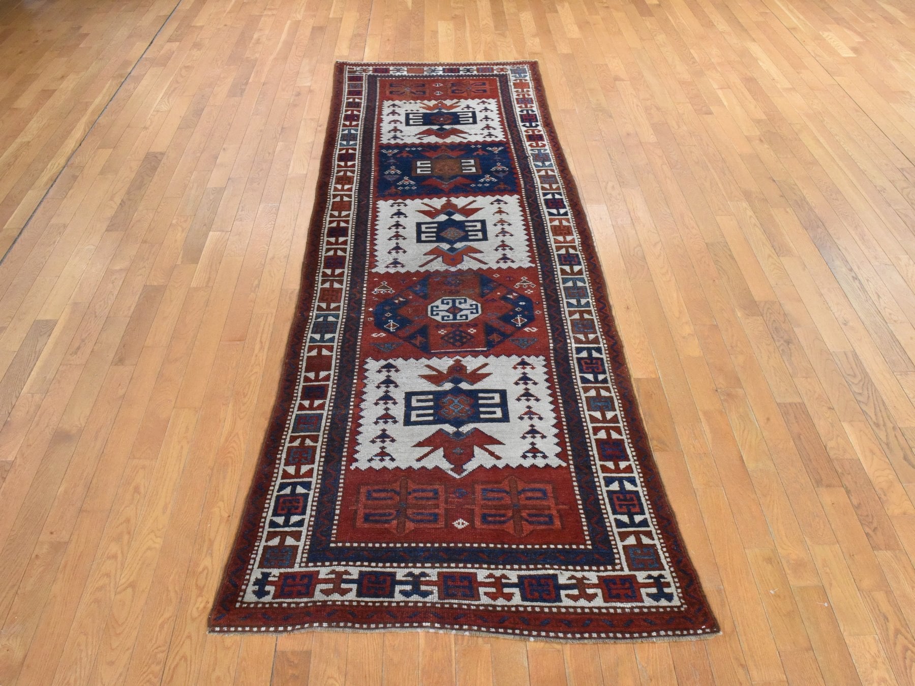 Antique hand-knotted wool runner in Ivory, 3'6" x 12'2" — SKU O078547 (view 2)