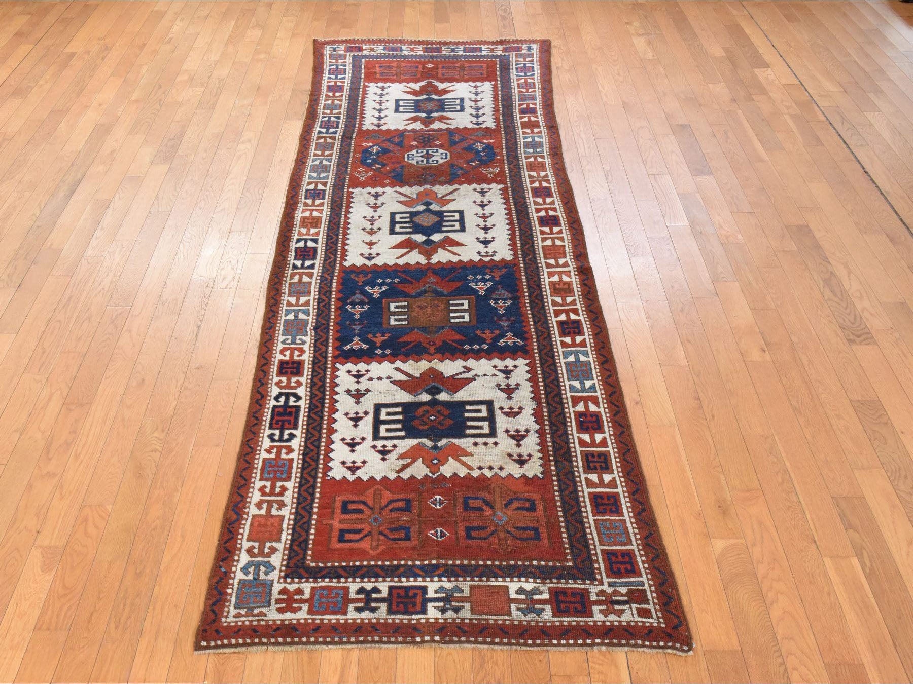 Antique hand-knotted wool runner in Ivory, 3'6" x 12'2" — SKU O078547 (view 3)