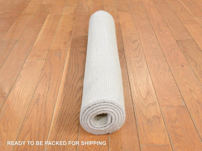 Ivory 2'6" x 4'8" Modern and Contemporary Hand knotted Wool Rug - Sku: O078552
