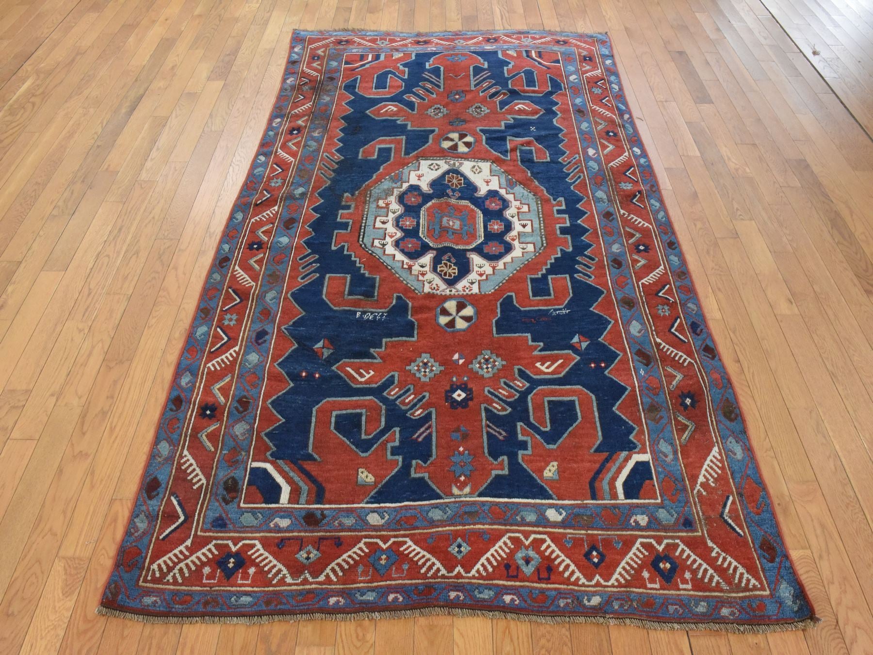 Kazak Antique hand-knotted wool rug in Red, 5'1" x 8'7" — SKU O078563 (view 2)